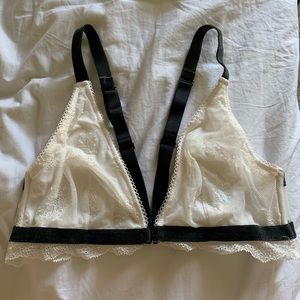 Cute lacy bra with black straps and a front clasp